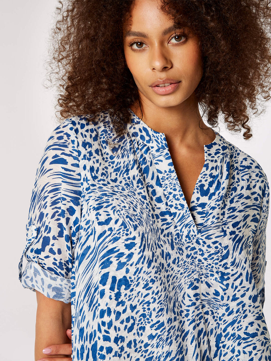 Kurzarmbluse Animal-Print | 
                Apricot